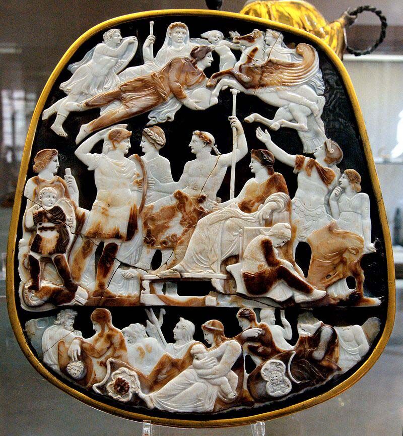 The Great Cameo of France made of Sardonyx. The Black onyx is in the background, figures are carved in relief in the foreground are in white and reddish-brown.