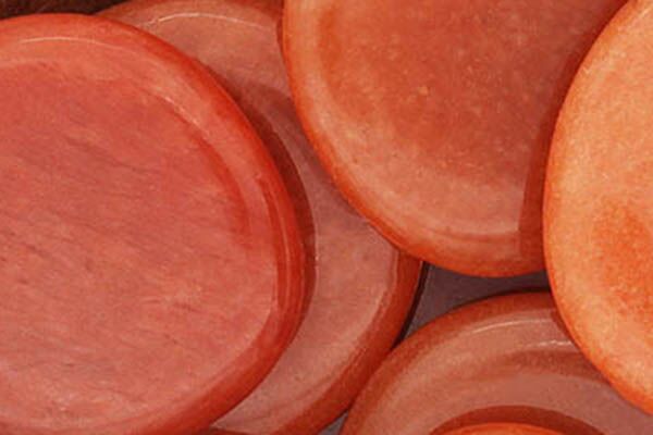 Close up of tumbled Orange Aventurine