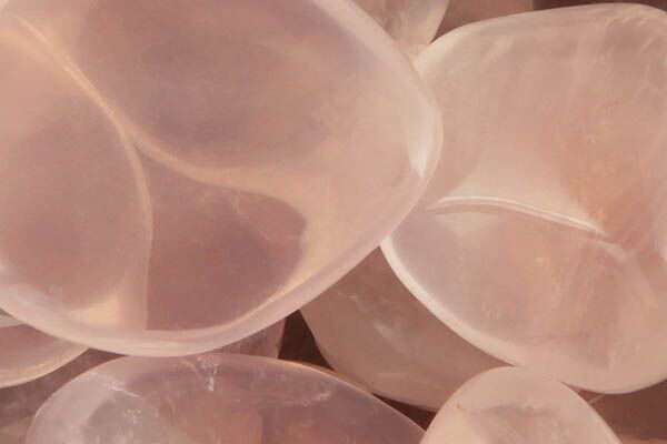 Close up of tumbled Girasol Rose Quartz