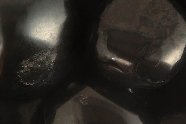 Close up of tumbled Shungite