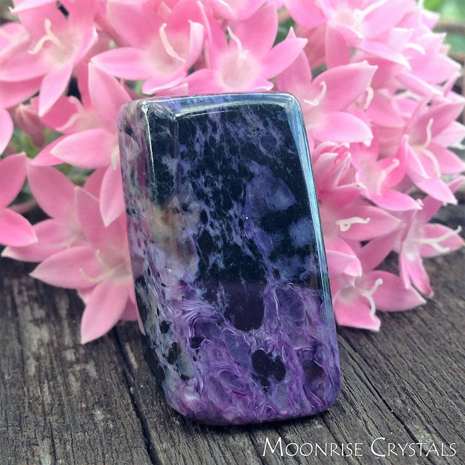 Charoite with pink flowers