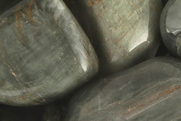 Close up of tumbled Cat's Eye