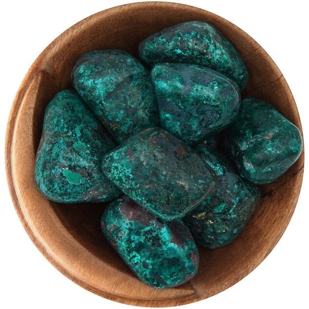 Bowl of tumbled Dioptase. Irregularly shaped polished stones, vibrant dark green, speckled
