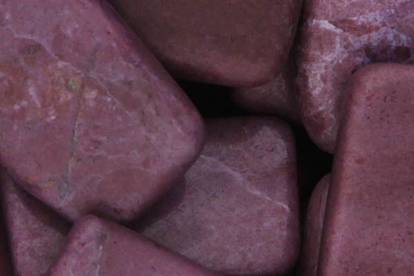 Close up of tumbled Purple Jade