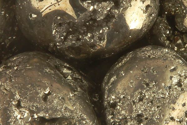 Close up of tumbled Pyrite