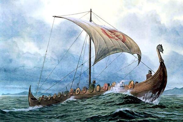 Viking ship at full sail with a dragon head