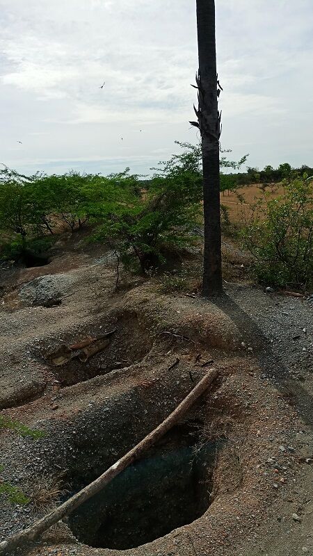 Entrance to an iolite mining shaft, basically just a hole in the ground