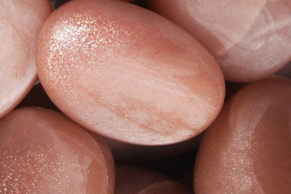 Close up of tumbled Peach Moonstone