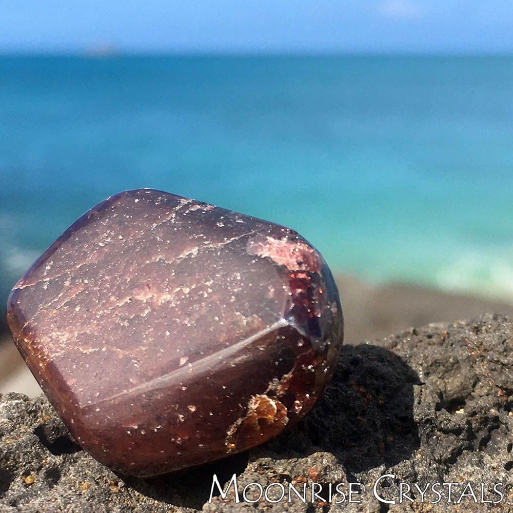 Almandine-Garnet-Feel-Loved-Crystals-Moonrise-Crystals2 Almandine Garnet with the ocean in the background