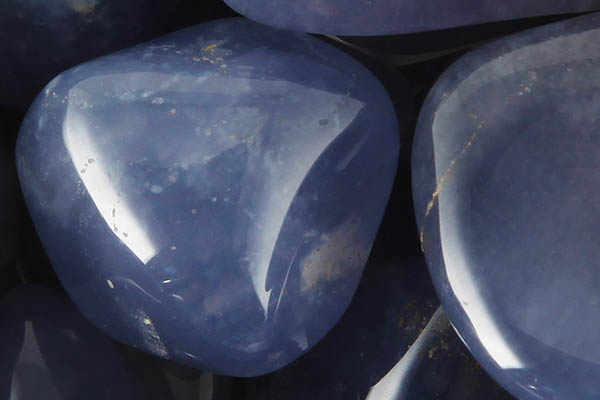 Blue Chalcedony Meaning Close up of tumbled Blue Chalcedony