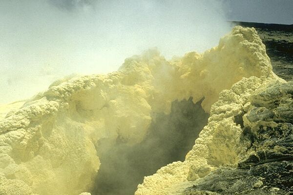 Pale yellow fumarole with a texture that resembles foam