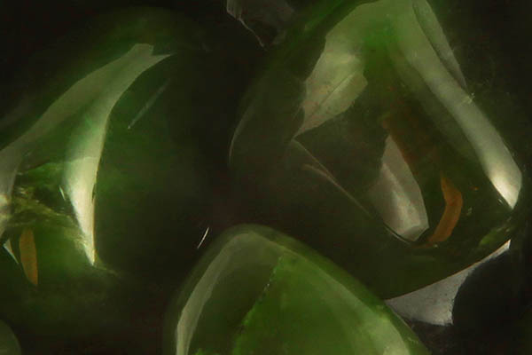 Green Jade Canada Meaning Close up of tumbled Green Jade