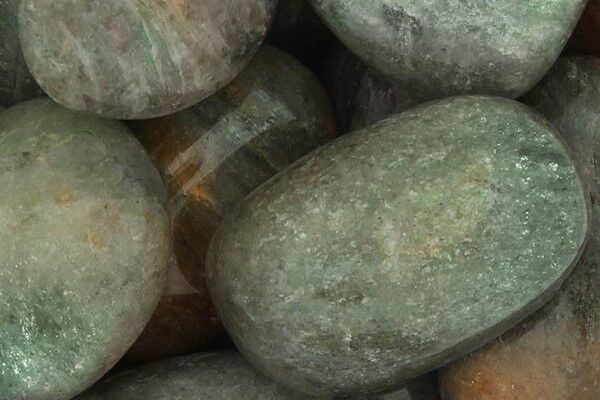 Greenlandite 600 Close up of tumbled Greenlandite