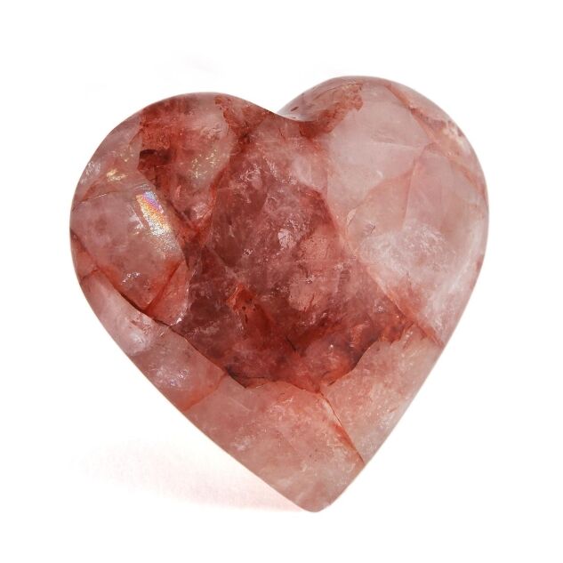 Puffy Red Hematite Quartz heart, perfectly smooth with a softly rounded tip and a silvery shimmer. Clear Quartz with red inclusions of Hematite, may include rainbows