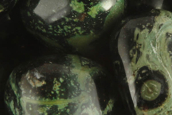 Kambamba Jasper Meaning Close up of tumbled Kambaba Jasper