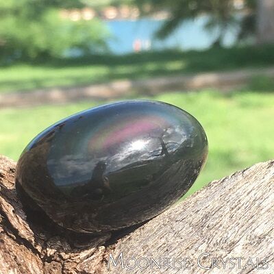 Rainbow-Obsidian-400 Rainbow Obsidian outside, showing a rainbow arch