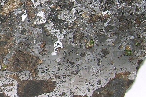 Udei Station Meteorite Silver Udei Station Meteorite with tiny green diopside crystals