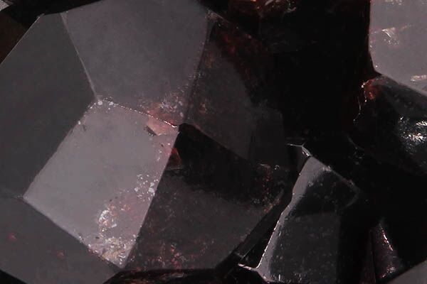 Close up of tumbled Almandine Garnet