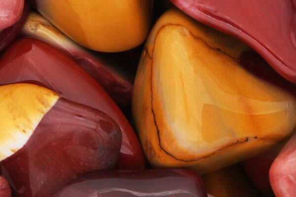 Close up of tumbled Mookaite Jasper