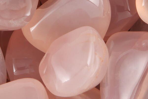 Close up of tumbled Pink Chalcedony