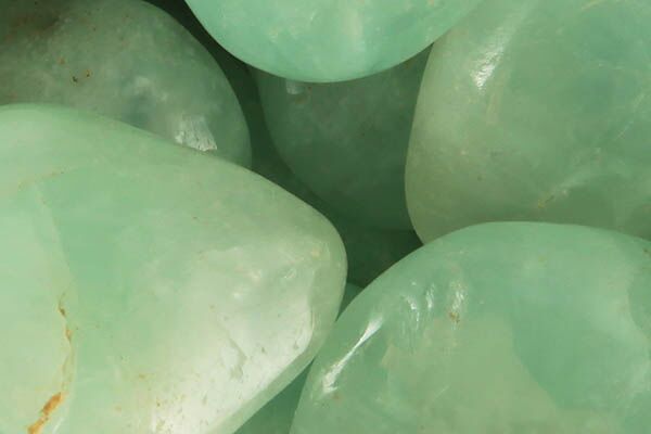 Close up of tumbled Prehnite