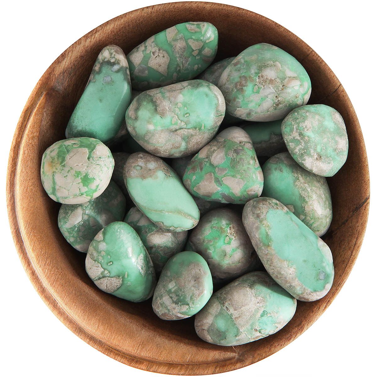 Bowl of tumbled Variscite. Irregularly shaped polished stones, light green with a grayish matrix
