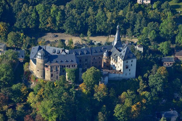 Vogtland German Castle surrounded by woods