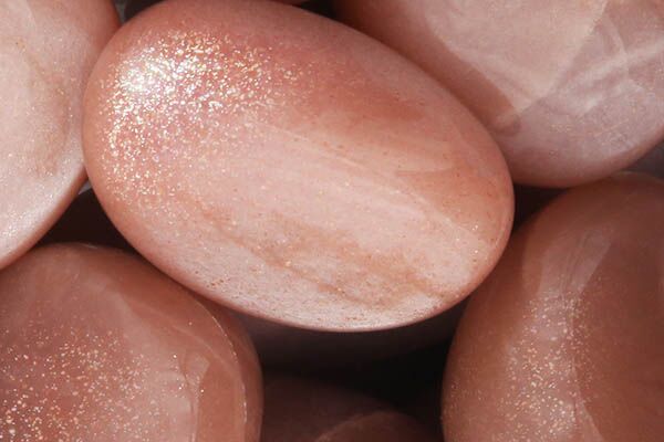 Close up of tumbled Peach Moonstone