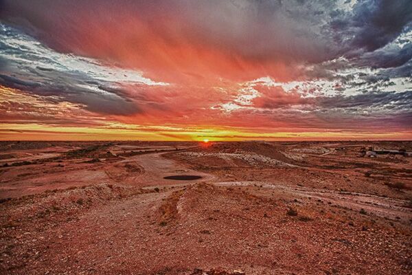 Sunset at Coober Pedy, looks like a waste land of red dirt