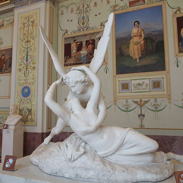Marble sculpture of Cupid embracing Psyche