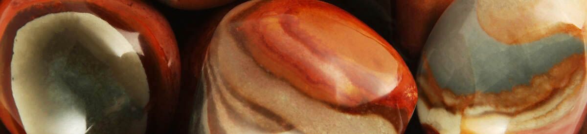 Close up of tumbled Desert Jasper