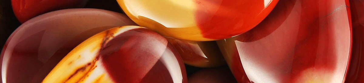Close up of tumbled Mookaite Jasper