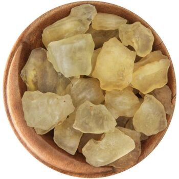 Bowl of lightly tumbled Libyan Desert Glass. Smoothly polished but with very irregular shapes, bright yellow