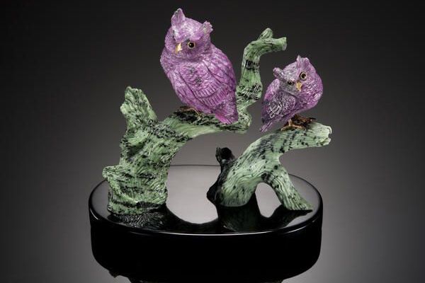 Ruby Zoisite carving of owls. The zoisite is carved into branches and the ruby into two owls