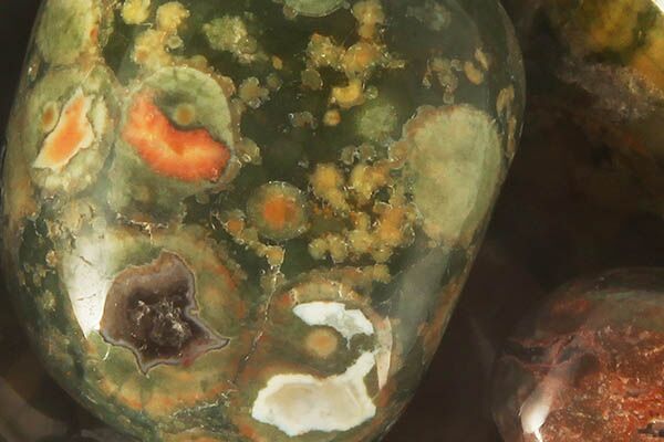 Close up of tumbled Rainforest Jasper